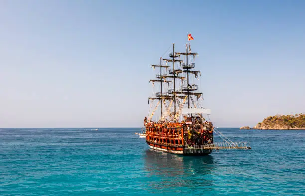 Photo of Tour boat in sea. Boat is a pirate themed boat in Oludeniz.