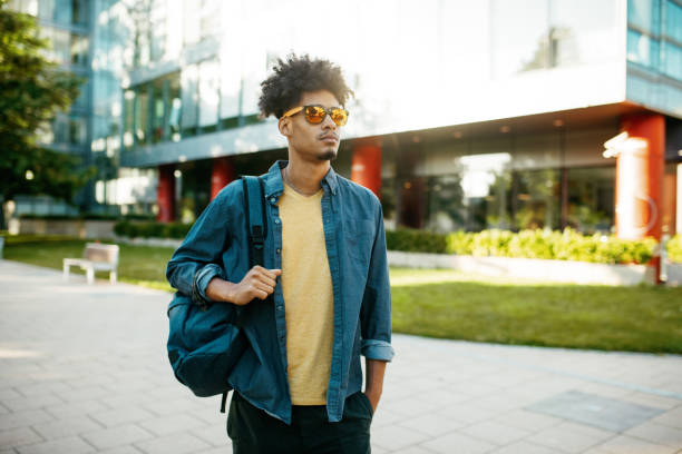 istock Mixed race millennial man with sunglasses in downtown 1337309577