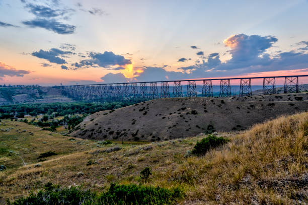 Views of the steel truss of the Lethbridge High Level Rail Viaduct Views of the steel truss of the Lethbridge High Level Rail Viaduct railway bridge photos stock pictures, royalty-free photos & images