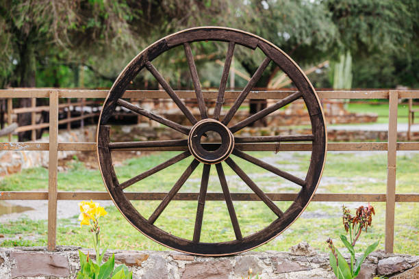 istock Old wooden cart wheel 1337312771