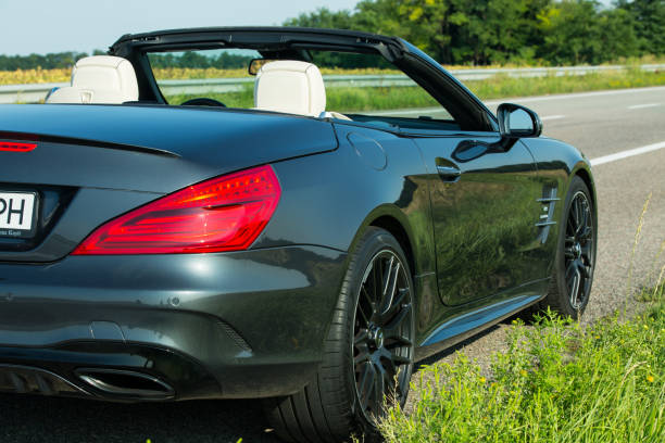 Photos of the Mercedes Benz SL550 convertible on the road. Dnepropetrovsk, Ukraine - 08.24. 2021: Photos of the Mercedes Benz SL550 convertible on the road. n11 stock pictures, royalty-free photos & images