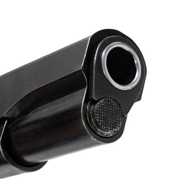 istock Muzzle of a semi-automatic pistol quartering toward the viewer 1337317359