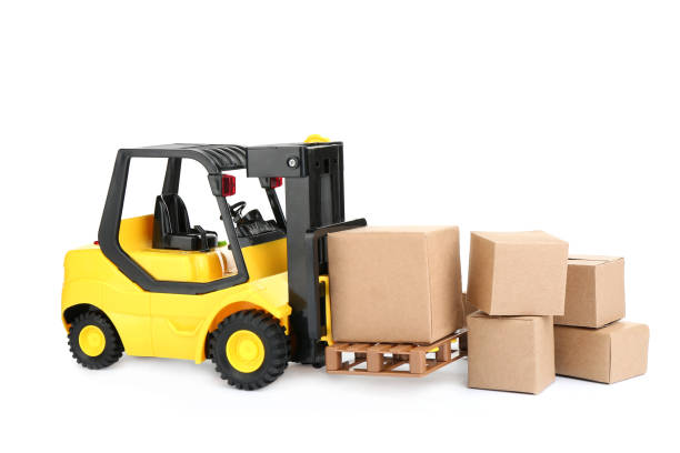 istock Forklift model and carton boxes on white background. Courier service 1337318380