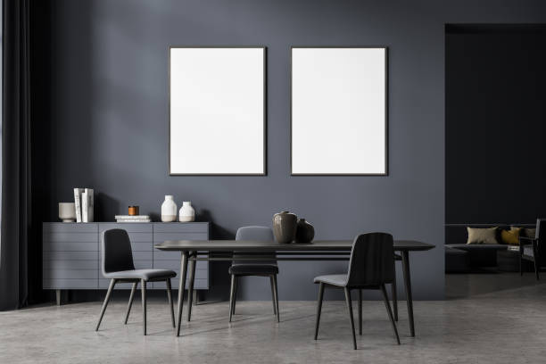 istock Two posters in the dark grey waiting room studio with table 1337322395