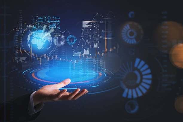 istock Man hand holding a digital hologram, hud with globe and financial data 1337322492