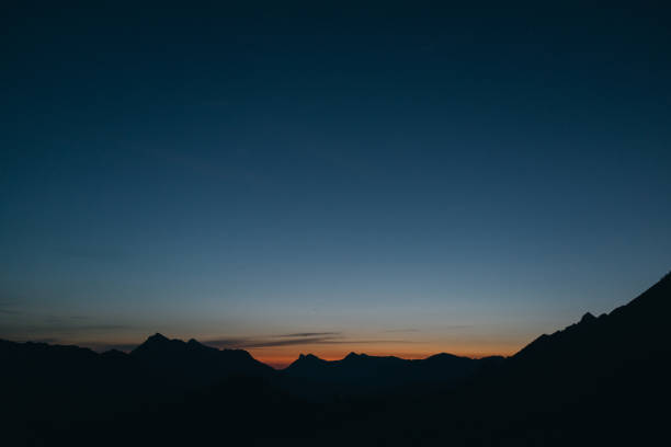 istock Scenic view of mountains at dusk 1337329627