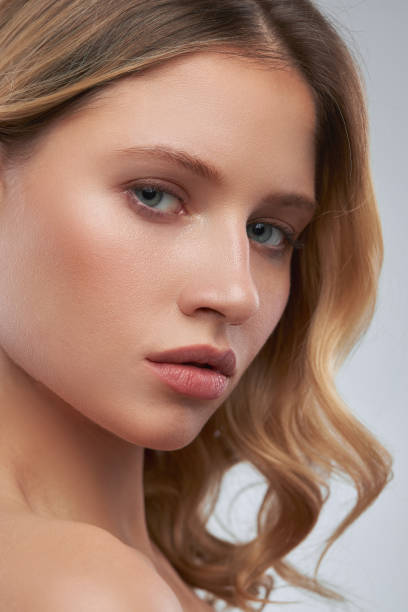 istock Pretty lady with clear skin posing with no makeup. 1337330689