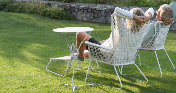 istock Couple relax in a garden 1337332799