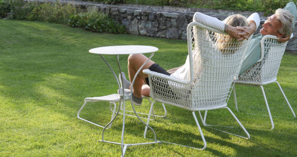 istock Couple relax in a garden 1337332802