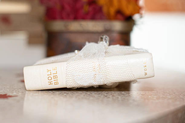 istock White white Holy Bible wrapped in lace on fall inspired table 1337333062