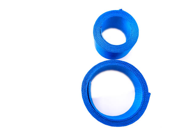 istock two rolls of blue ribbon isolated 1337338073