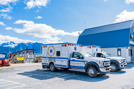Two Ambulance trucks in port of Seward , Editorial use only .Alaska USA 08,08.2021
