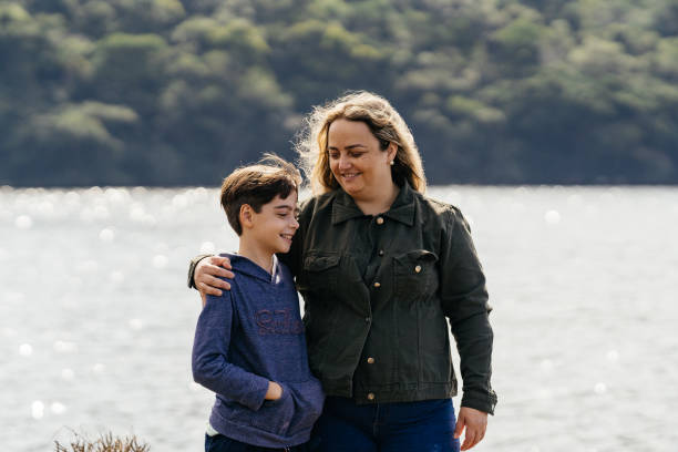 istock Mother and son by the lake 1337340561