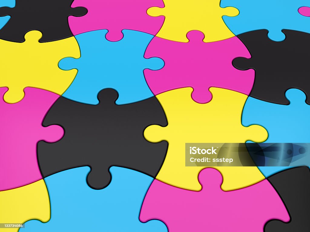 Jigsaw Puzzle pezzi in colori CMYK - Foto stock royalty-free di Industria tipografica