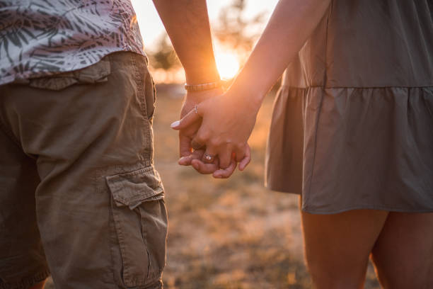 istock Couple in love holding hands 1337344421