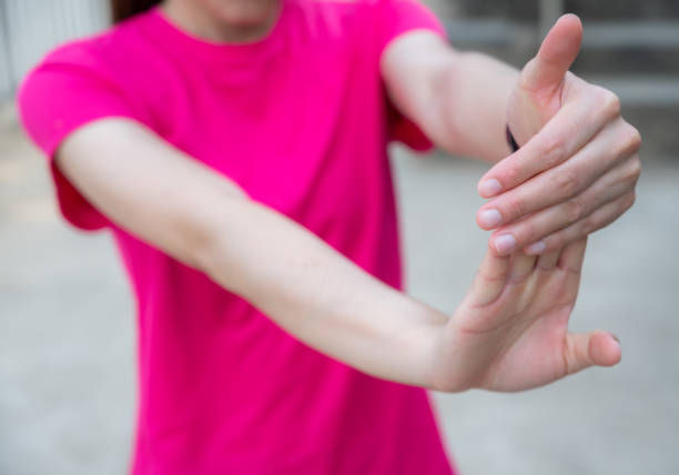 istock Close up of woman doing stretching fingers before workout. 1337348353