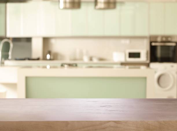 istock Empty wooden table and blurred kitchen background, product montage display 1337351422