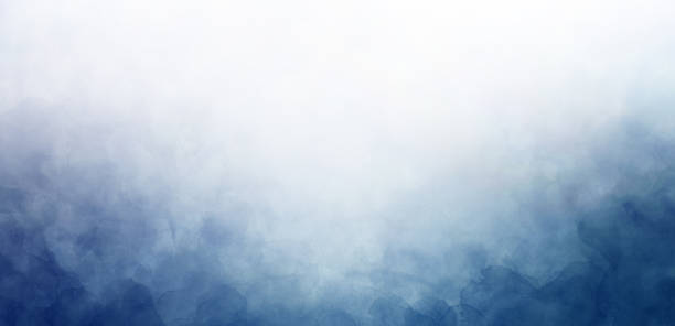 blue watercolor border on white background, gradient texture and color in cloudy sky or foggy haze design, clouds or smoke painting stock photo