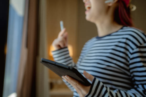 istock Office lady planning an event with a colleague online. 1337357845