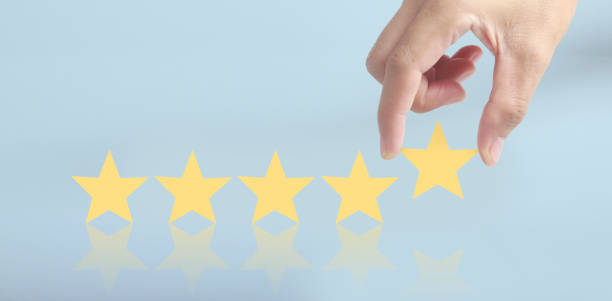 istock Rise on increasing five stars in human hand, Increase rating evaluation 1337358463