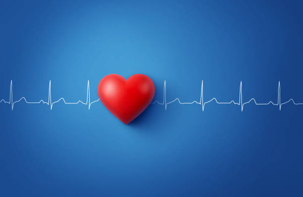 istock Red heart with white EKG line on blue background 1337360660