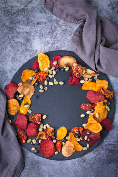 istock Dried vegetables, dehydrated sweet potato, parsnip, beetroot chips, snacks 1337362857