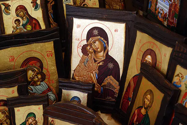 Greek Orthodox religious Icons displayed at a store for sale in Tinos, Greece.