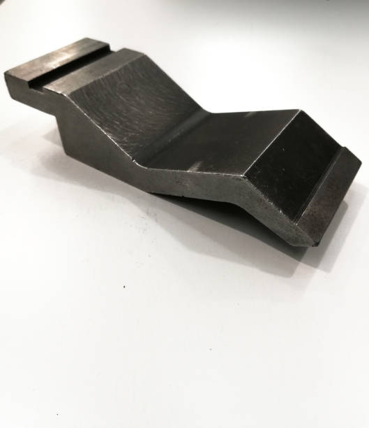 istock detail of a press brake punch on white background working tools concept 1337367264