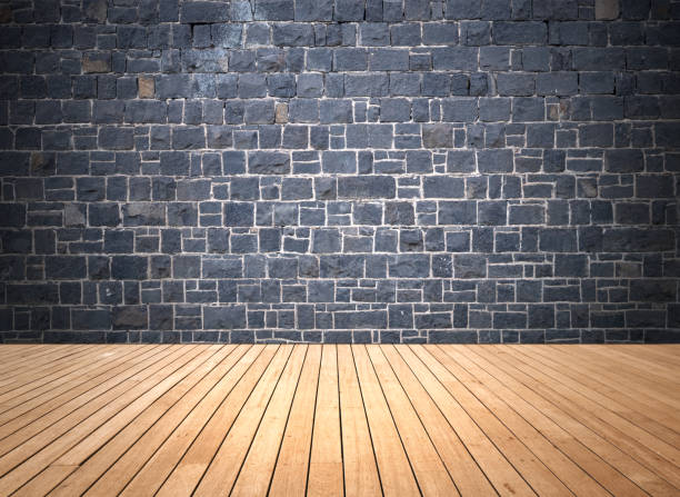istock Gray stone wall and wooden floor - Old room 1337370525