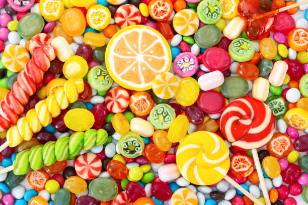 istock Colorful lollipops and different colored round candy. 1337373218
