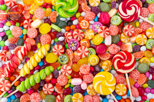 istock Colorful lollipops and different colored round candy. 1337373219