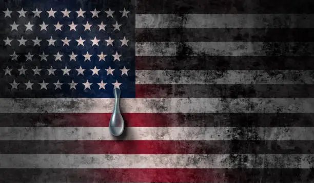 United States grief and American social crisis or US violence concept as a US flag crying a tear with the stars and stripes as a metaphor for national sorrow in a 3D illustration style.