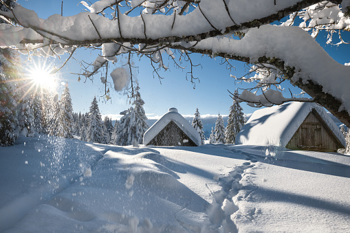 Snowcapped mountain village on a beautiful sunny day.