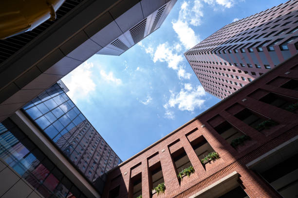 istock looking up, the sky and high buildings around 1337378422