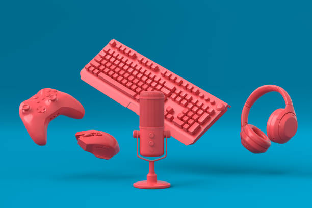 istock Flying gamer gears like mouse, keyboard, joystick, headset, VR, microphone 1337379593