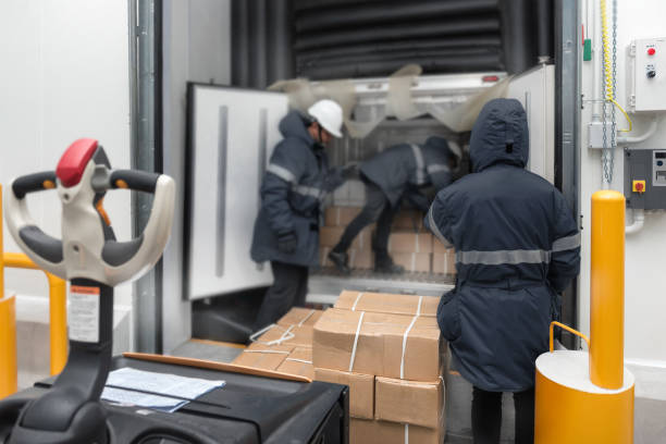 istock Transporting goods in the loading goods of the freezing warehouse. Storage for Ready-made foods or Ready-to-Eat Foods. Export-Import Logistics system concept. 1337381222