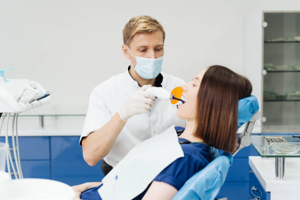 istock Young woman getting dental treatment. 1337391681