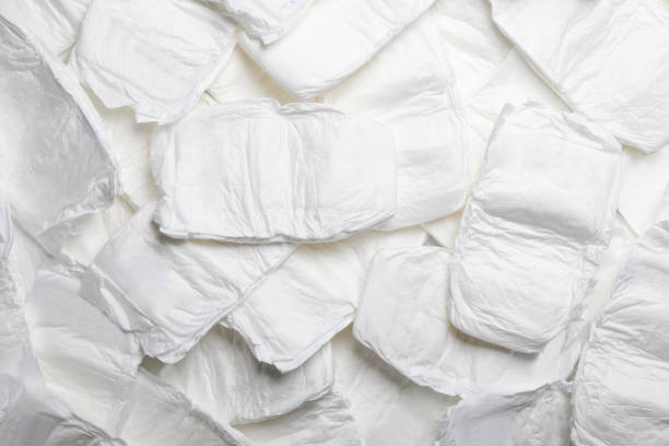 istock Baby diapers as background, top view. Child's garment 1337399846