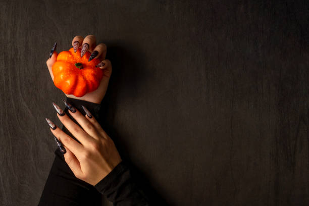 istock Halloween Nail Art Design, hands and decorations. 1337401894