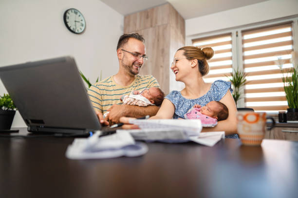 istock Parents care for baby while doing financial planning 1337403616