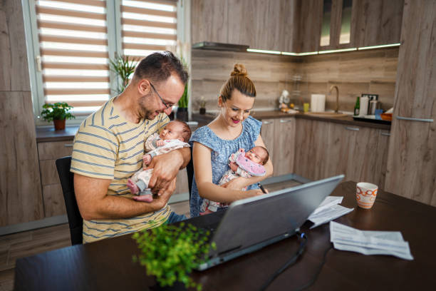 istock Parents care for baby while doing financial planning 1337403727