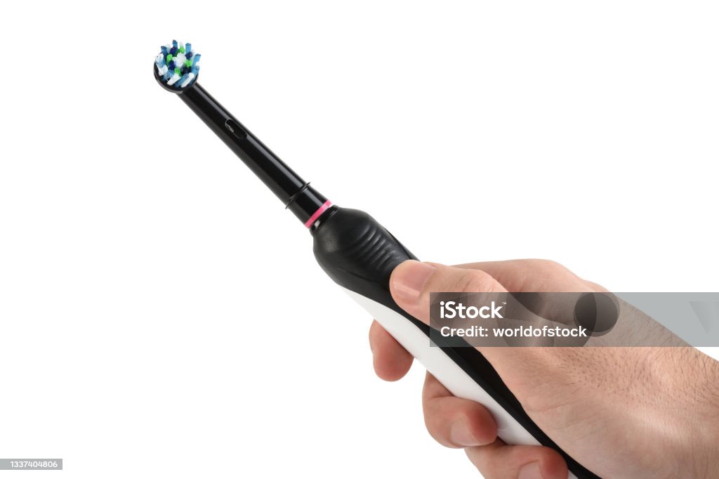 Toothbrush In Hand Hand Holding Electric Toothbrush On White Background With Clipping Path ...