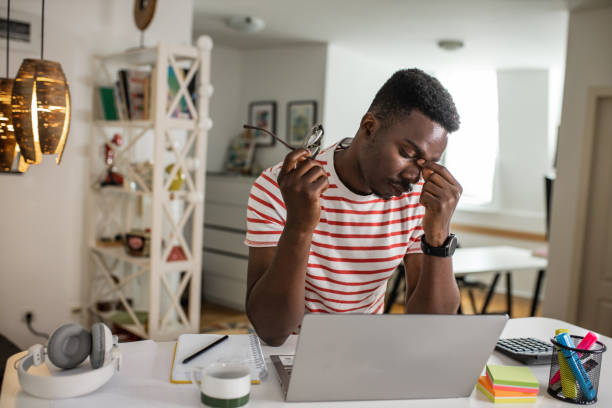 istock Stressful day and working from home for young man 1337405617