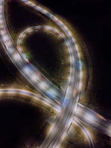 istock Highway road Junction at night, top view from drone 1337406077