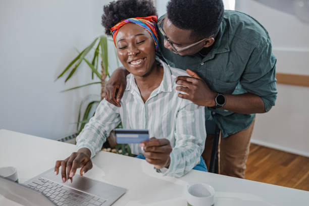 istock A young couple uses online banking services at home 1337406287