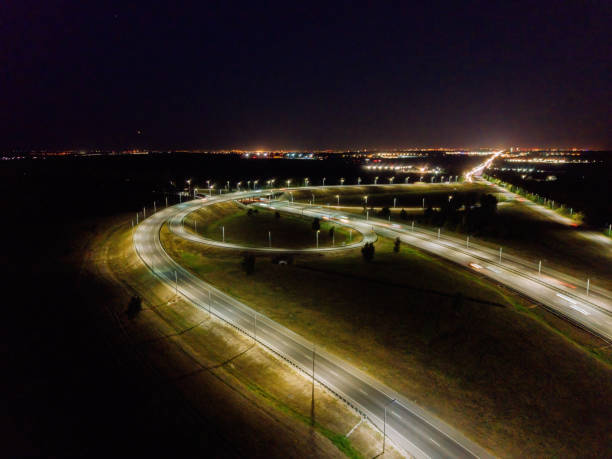 istock Highway road Junction at night, top view from drone 1337406310