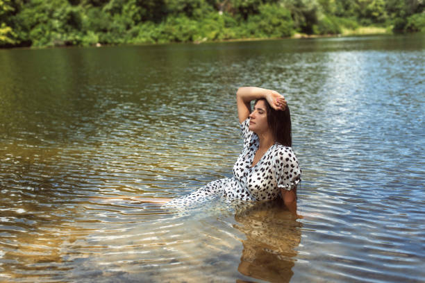 istock Summer day with a beautiful brunette 1337406365
