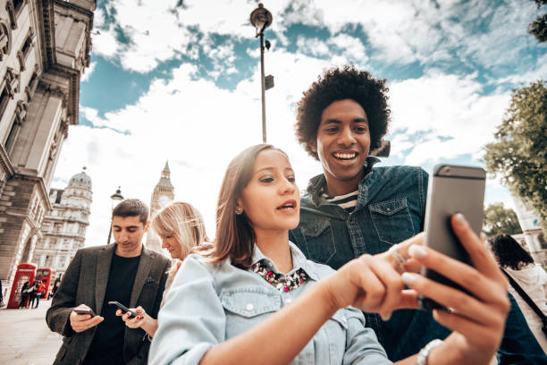 istock smiling friends having fun in london 1337409133