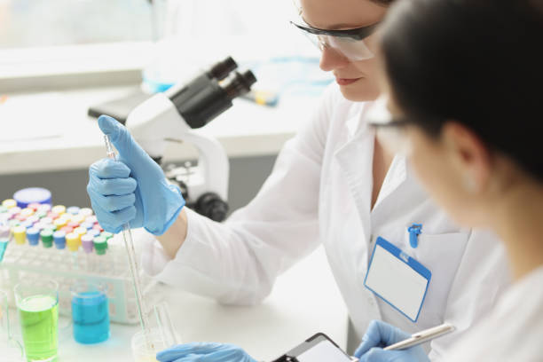 istock Two scientists conducting research in chemical laboratory 1337410435