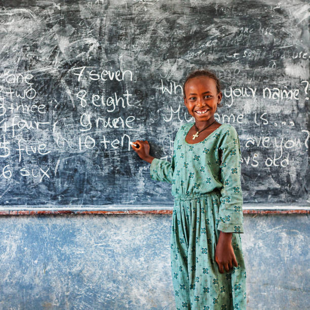 istock African little girl is learning English language 1337413244